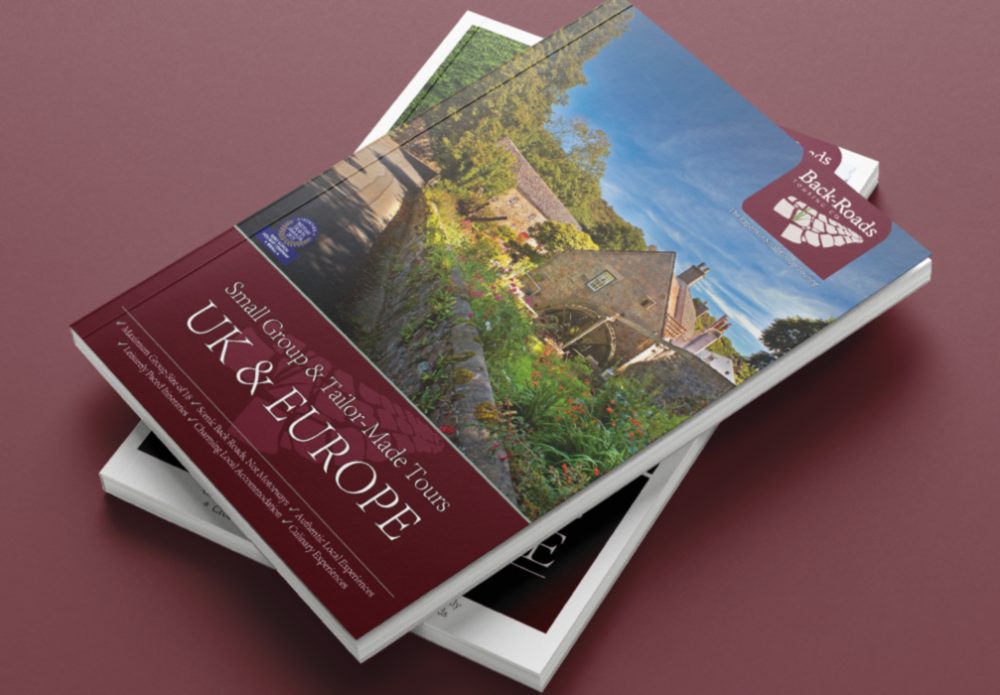 Stack of two different Back Roads Brochures showing the cover design - Travel Brochures.